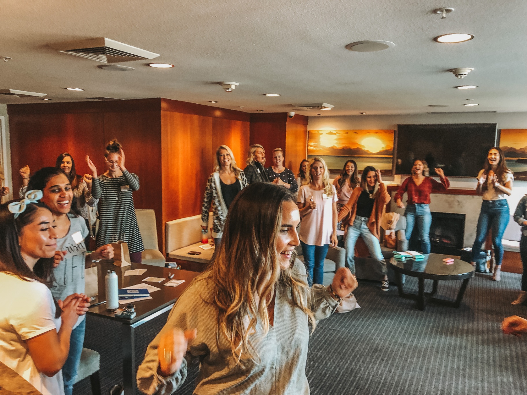 Women dancing and celebrating at a Healing Her workshop