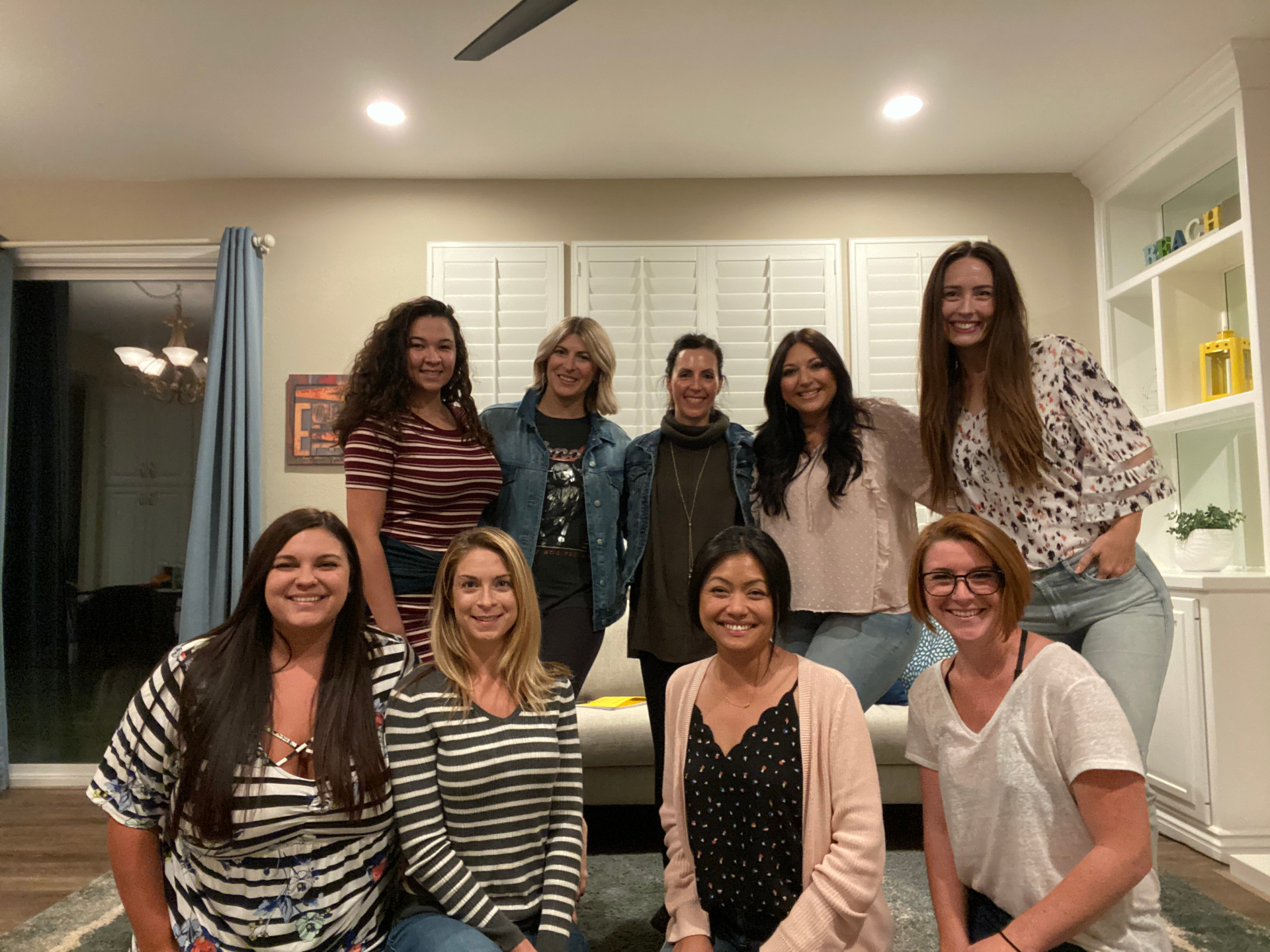 Small group portrait in a living room