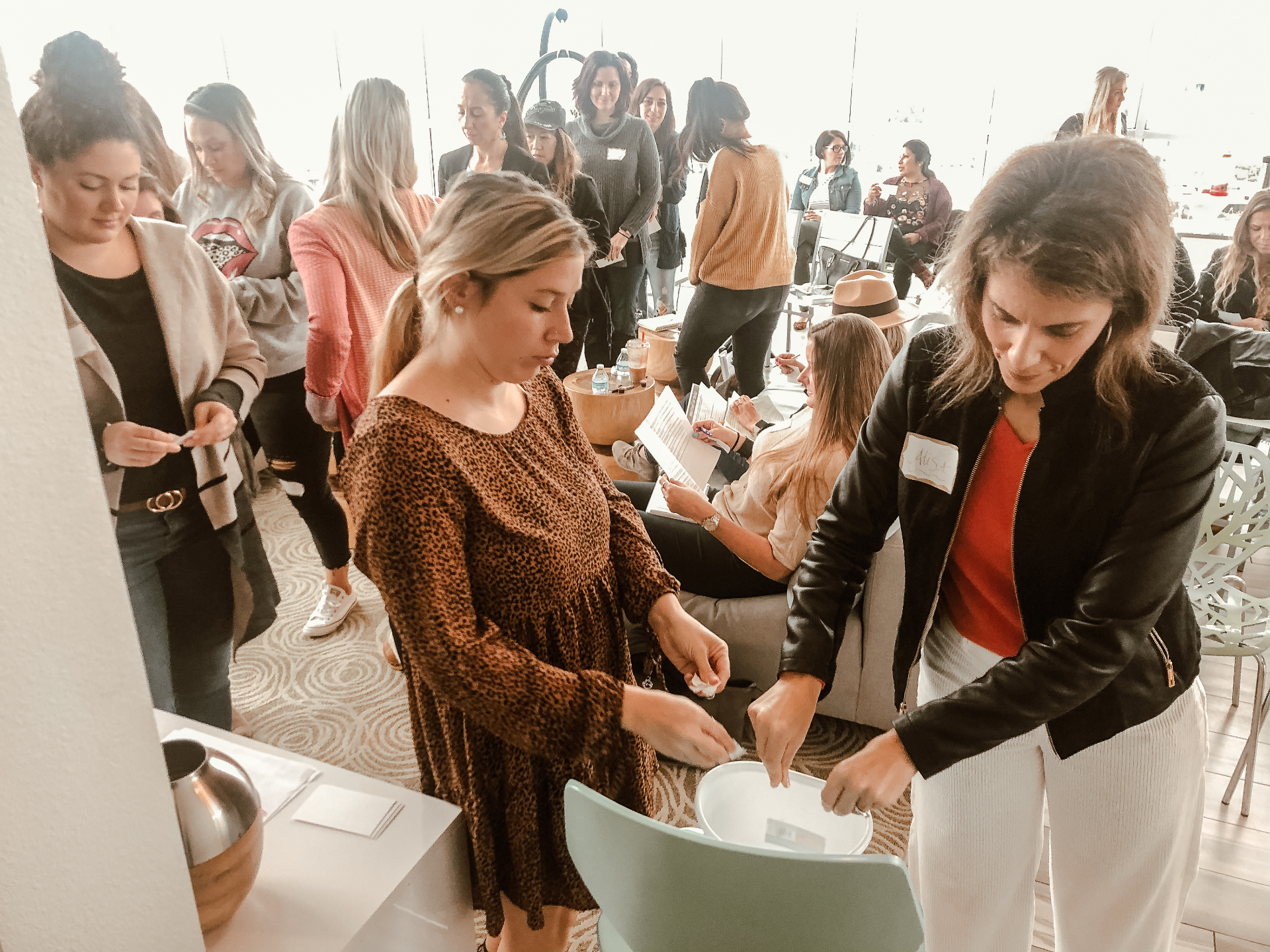 Women in a hands-on activity at a Healing Her workshop
