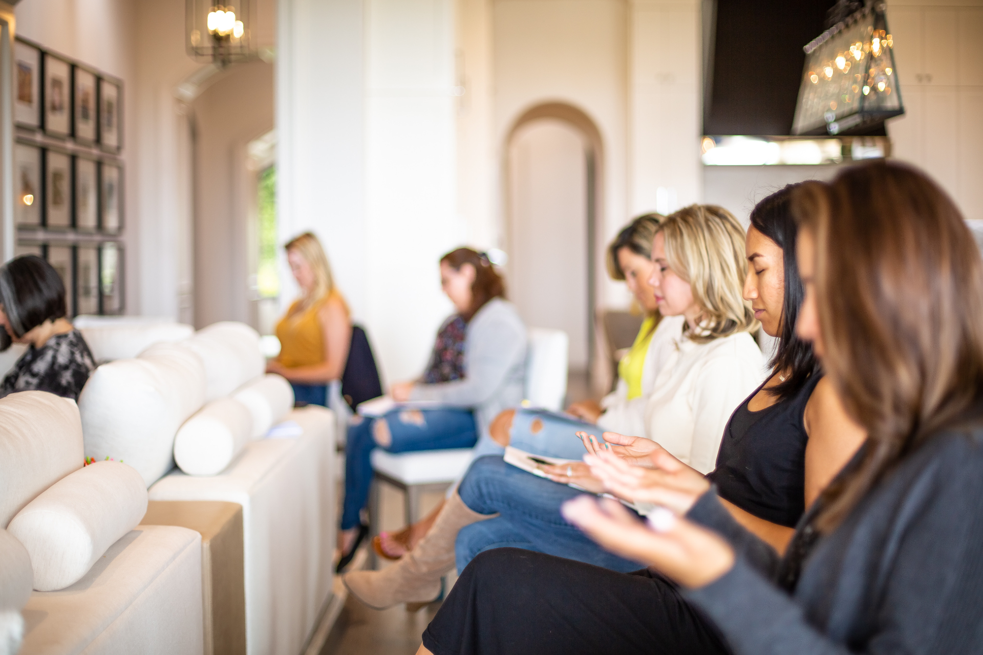 Women in a salon-style teaching room